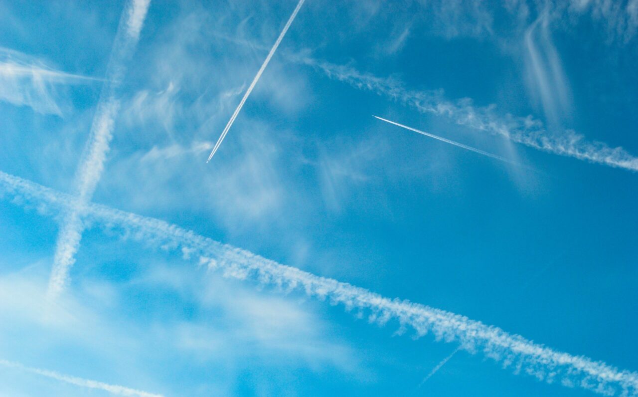 Plane vapour trails in the air