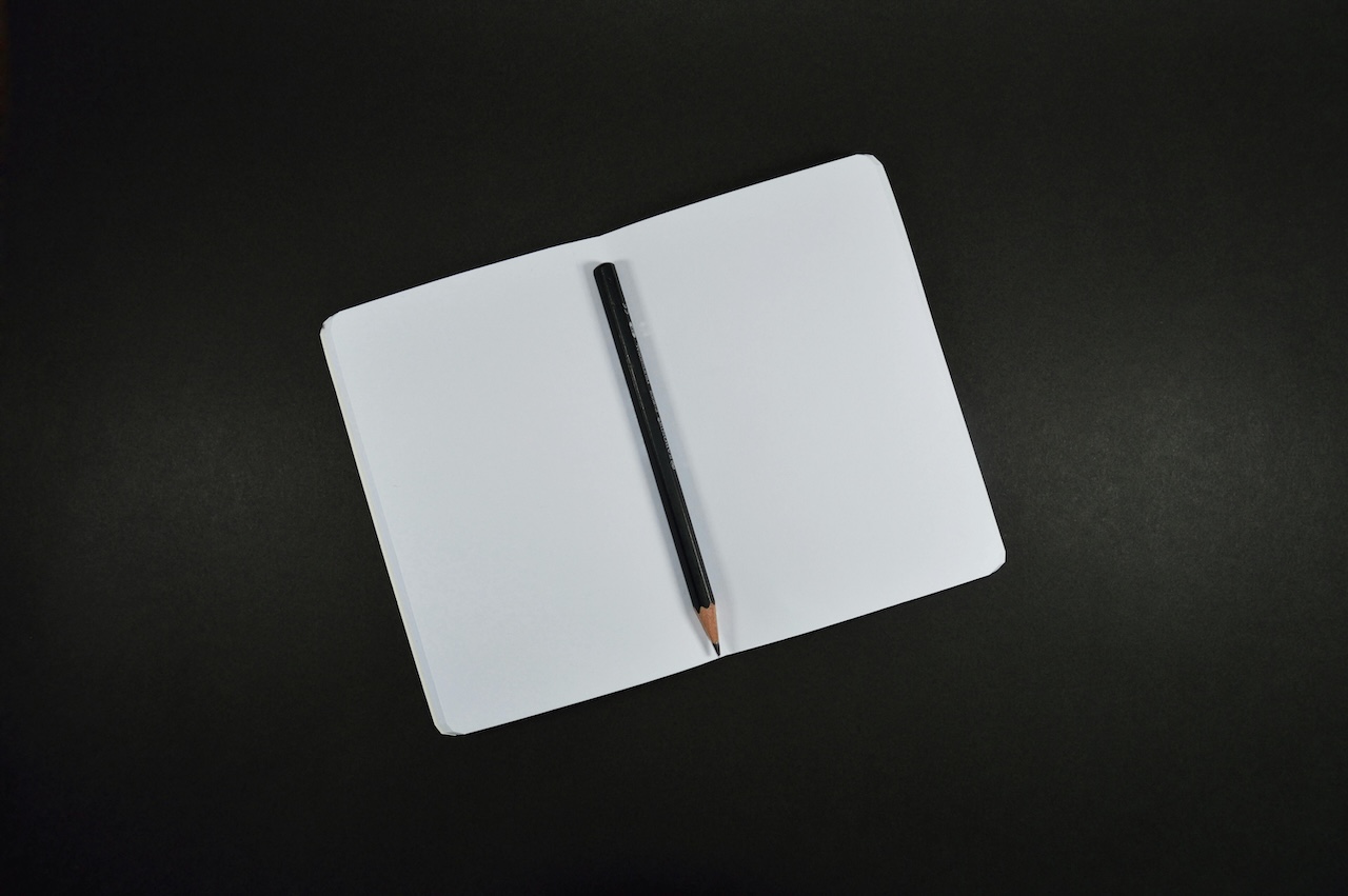 Picture of a blank notebook and pen