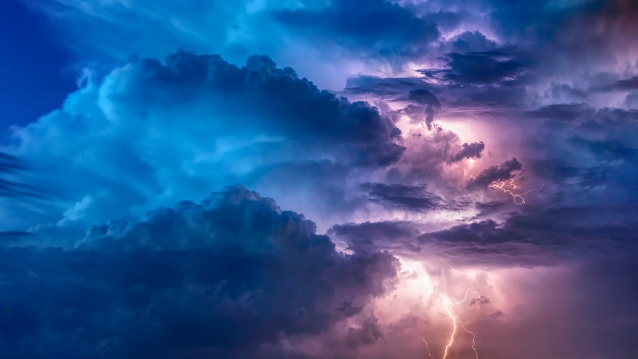 Picture of lightning against a stunning purple sky