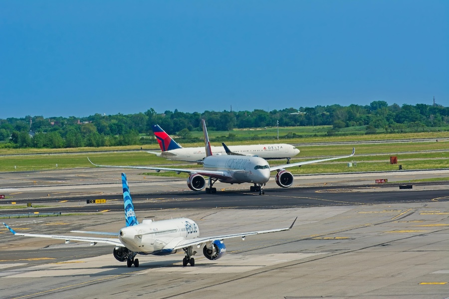 Picture of two planes on a runway