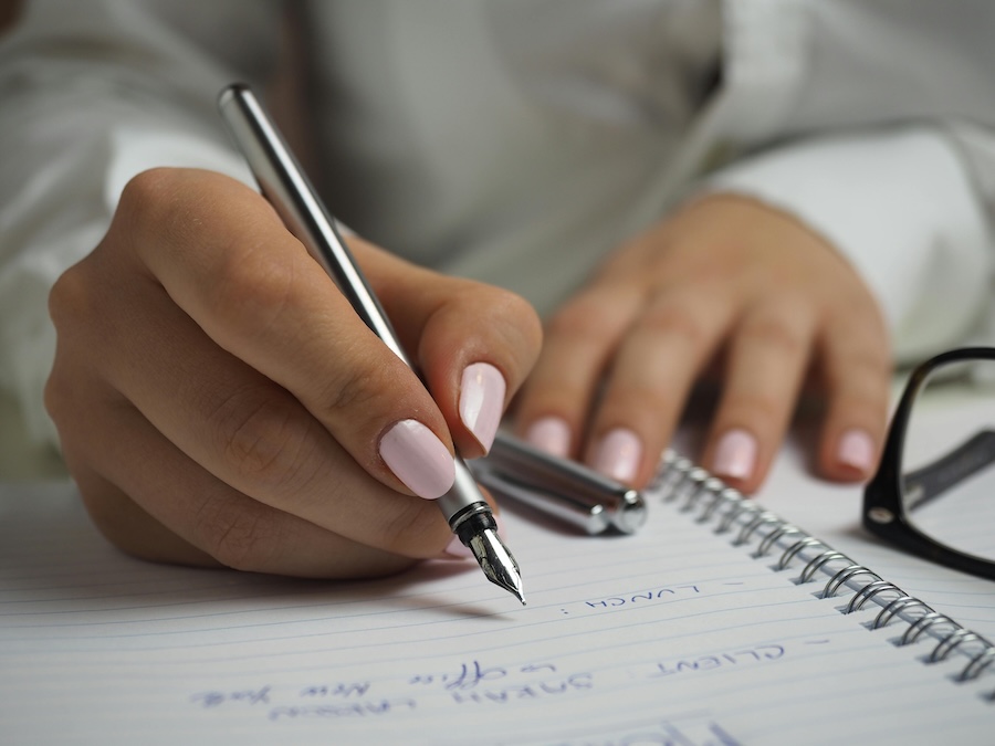 Picture of a woman making a list