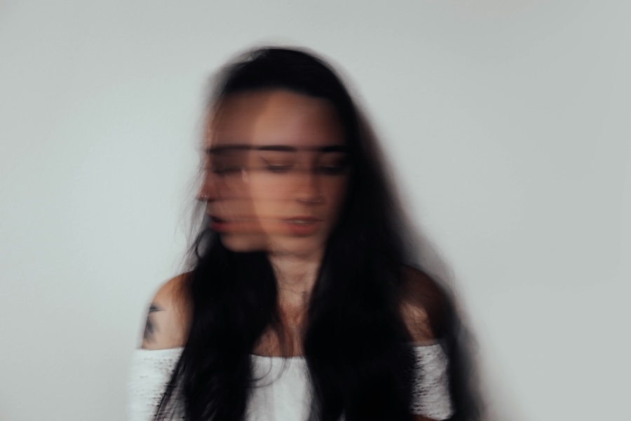 Blurred image of a woman's head