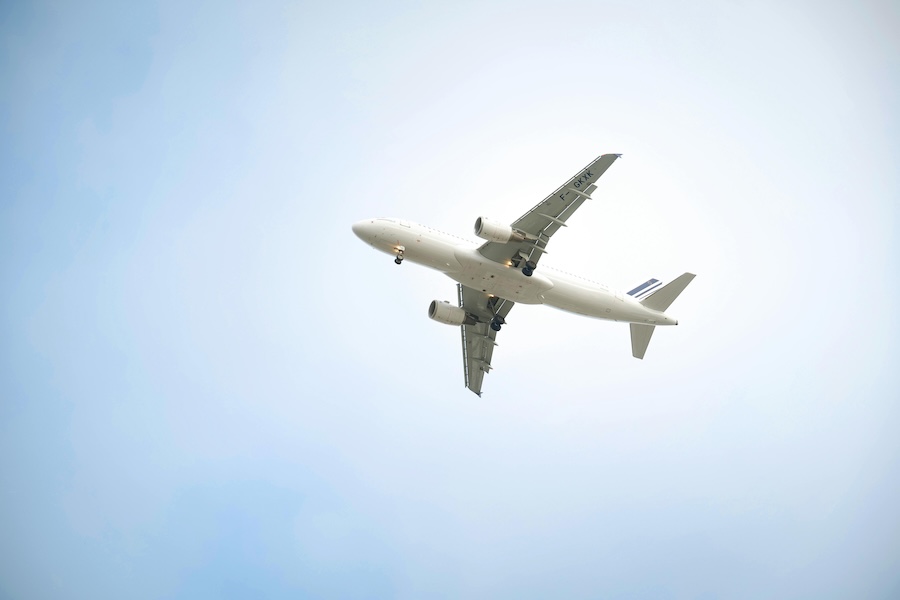 Image of a plane in the sky after takeoff