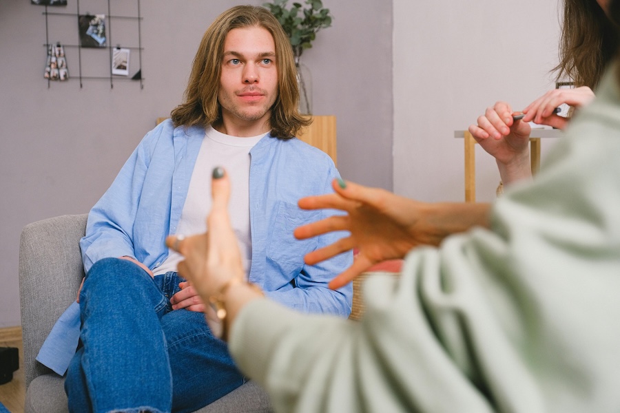 Image of someone having a therapeutic discussion 