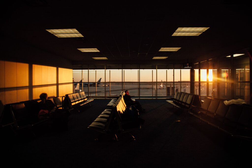 Inside of a airport terminal as the sun rises