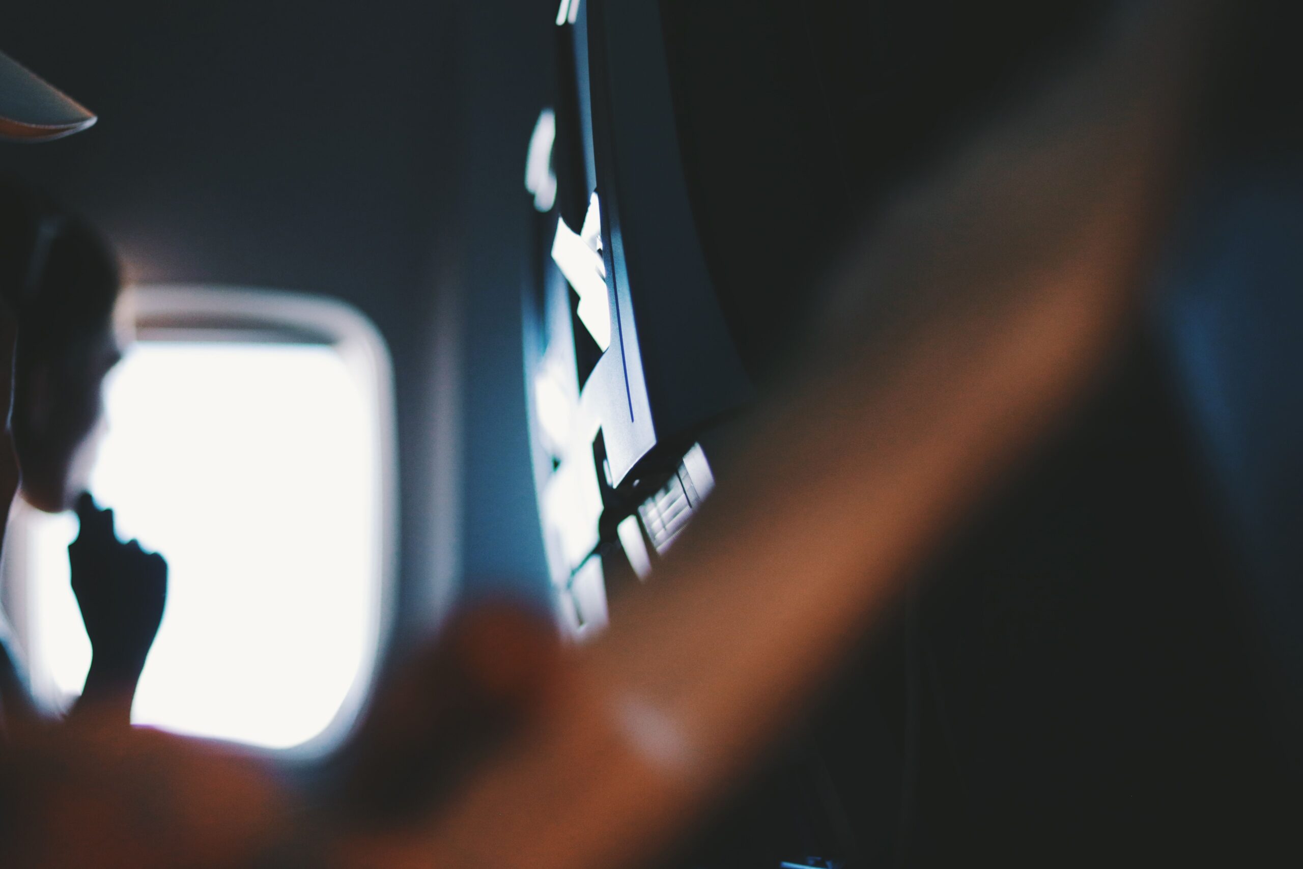 Person looking out of an aircraft window